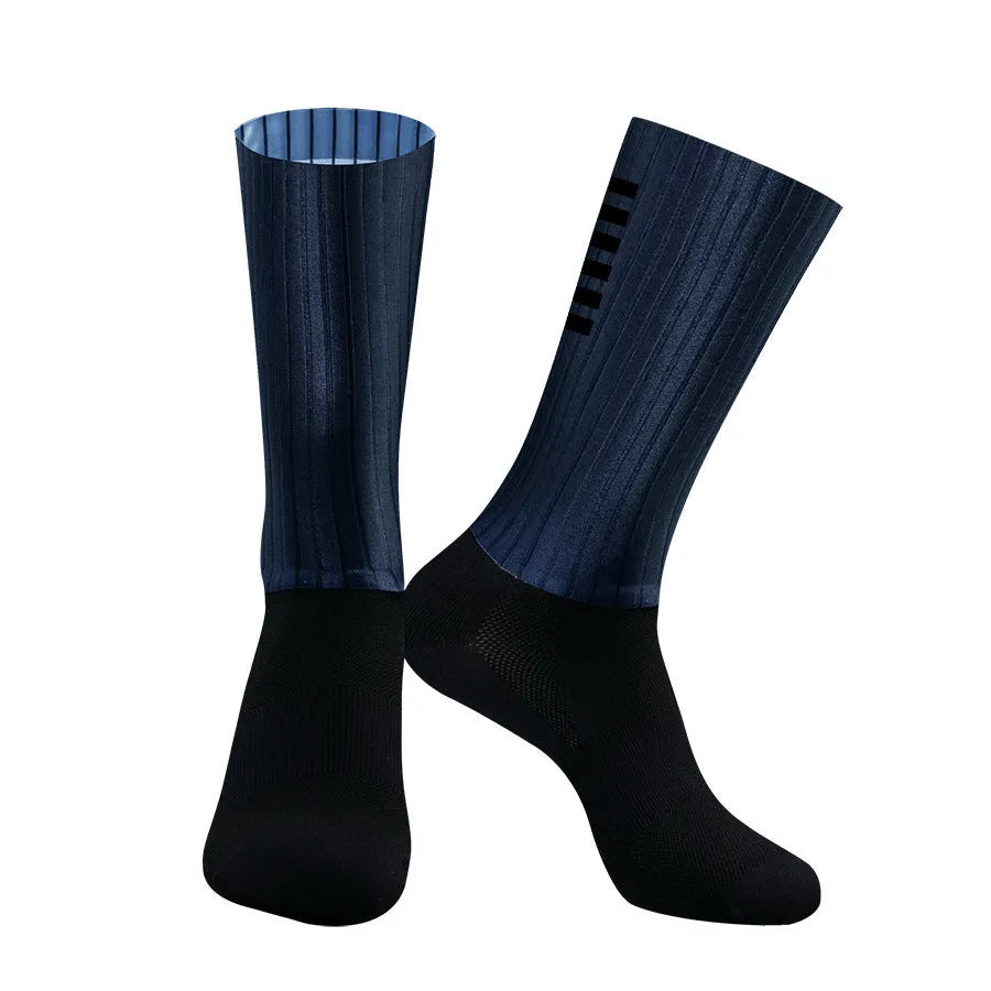A pair of breathable athletic cycling socks in a chemical fibre blend, shown in one of six available colours.