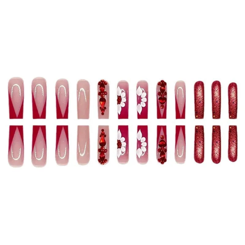 Sweet Flowers pattern removable false nails with red diamond accents in Long European Square shape.