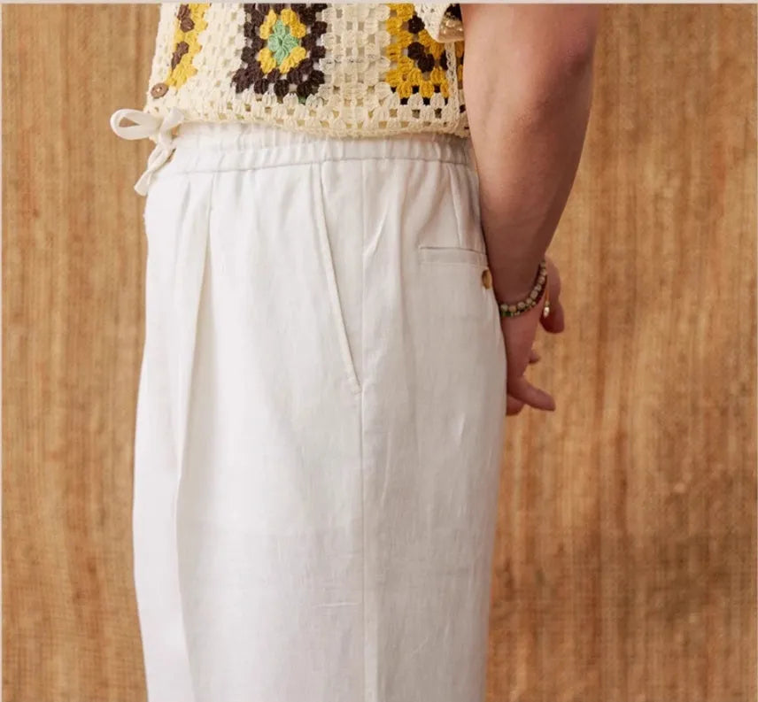 Women's linen high waist trousers with elasticated waistband and straight leg cut in navy blue