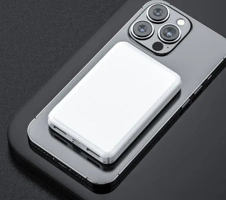 Black and white universal USB power bank for heated vests, showing compact size
