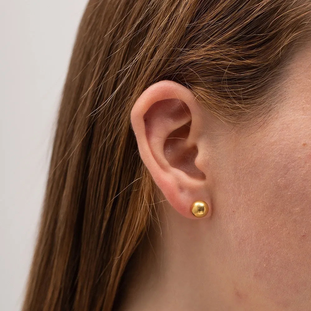 Stainless steel ball stud earrings in geometric round design with gold electroplating