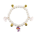 Purple simulated pearl cat collar with three Halloween pumpkin charms: ghost, skull, and smiley face.