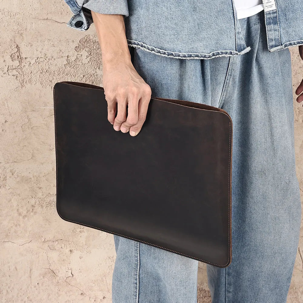 Brown genuine cowhide horizontal computer liner bag showing laptop compartment