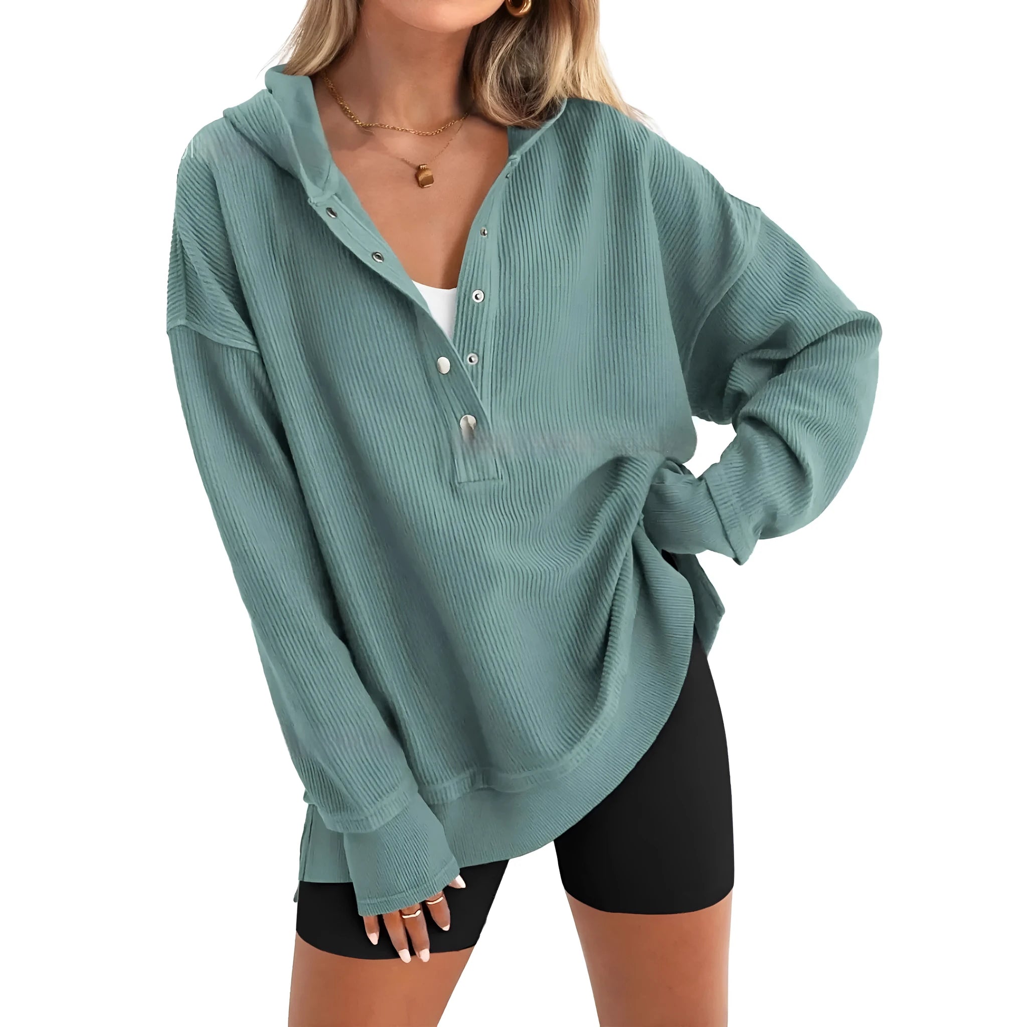Women's loose fit peacock green raglan sleeve pullover sweater on a hanger.