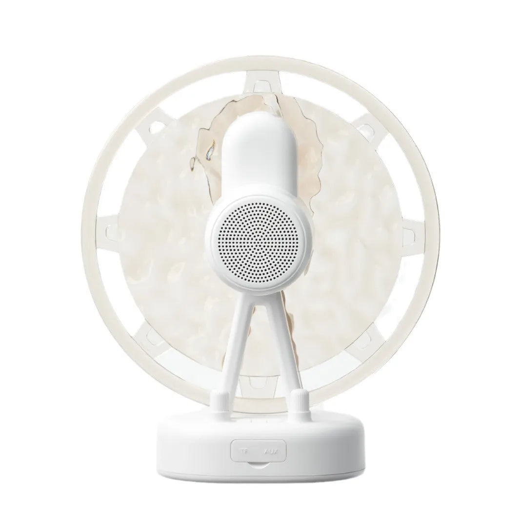 White and pink Ferris Wheel shaped Bluetooth speaker with colourful water ripple LED atmosphere lighting.