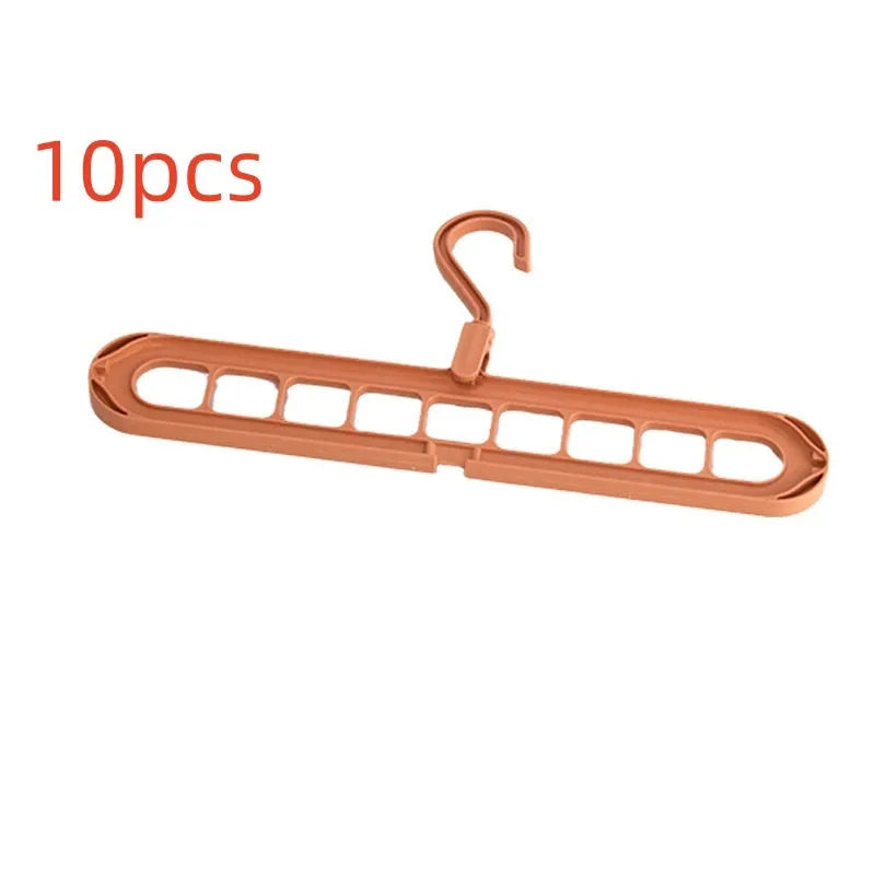 Multifunctional plastic nine-hole folding hanger for trousers, shown in beige, blue, green, pink, and grey colour options.