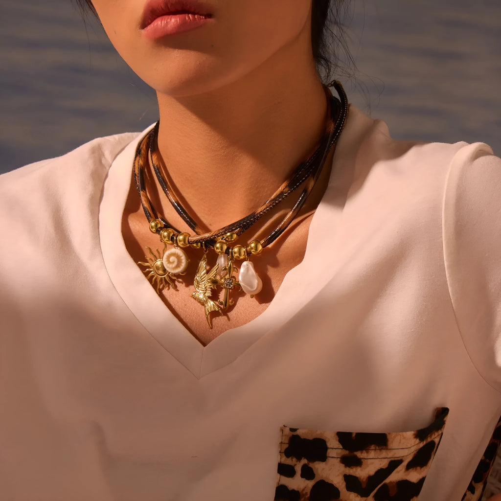 Women's stainless steel necklace with geometric leopard leather pendant on gold chain
