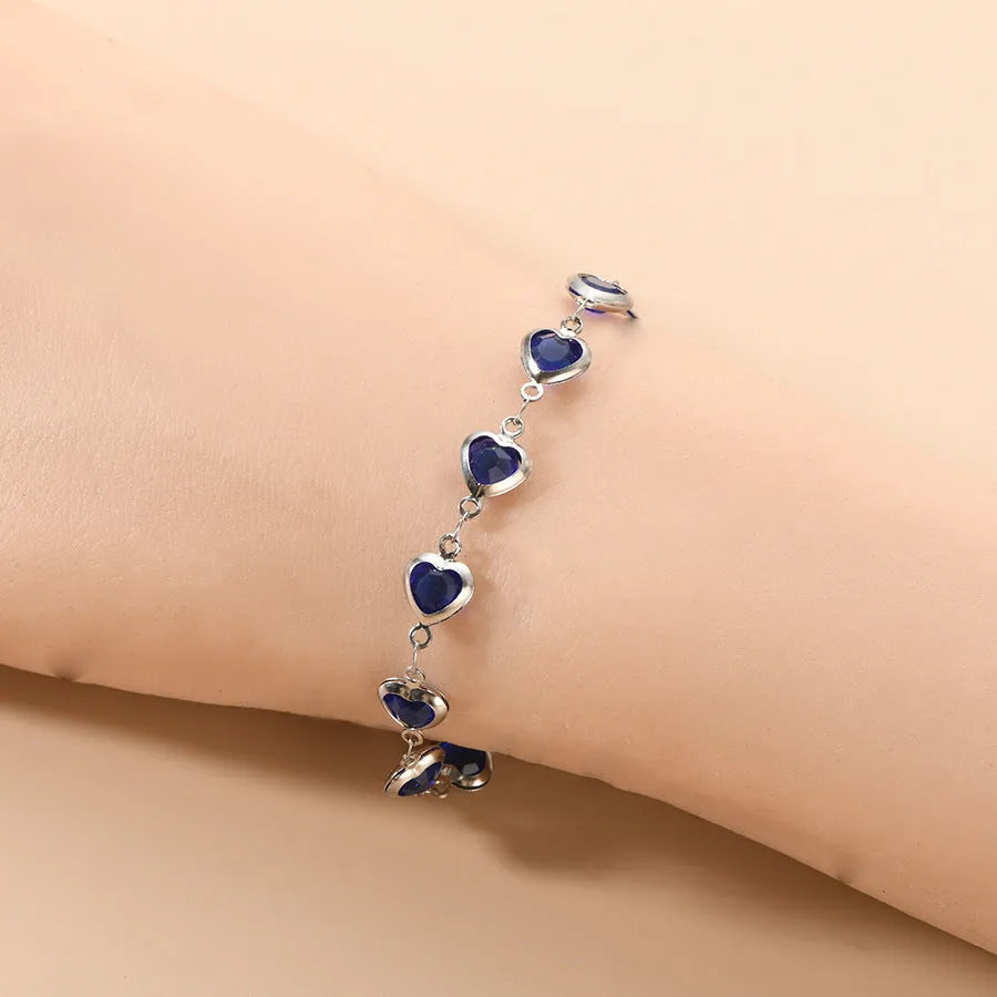 Devil's Eye geometric heart stainless steel bracelet with colourful electroplated finish.