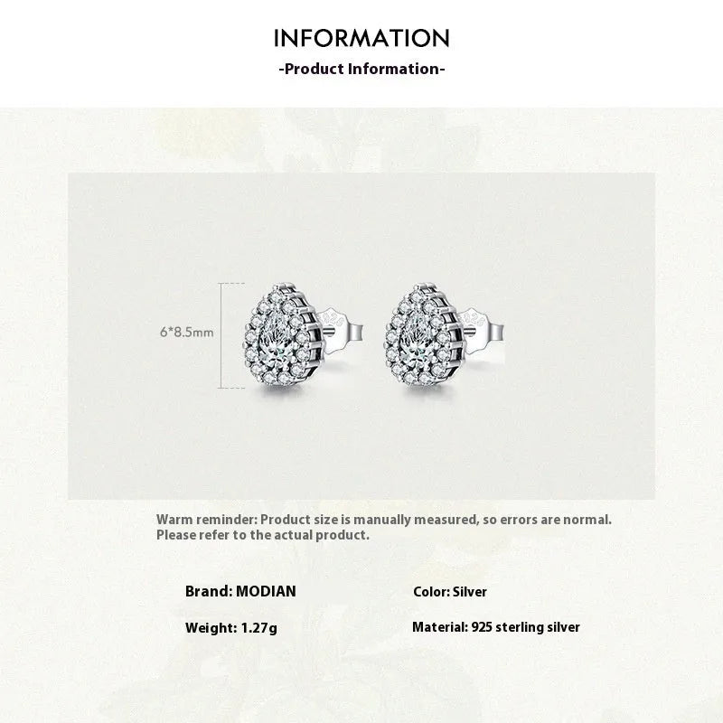 Women's sterling silver drop earrings with water drop shape and diamond treatment