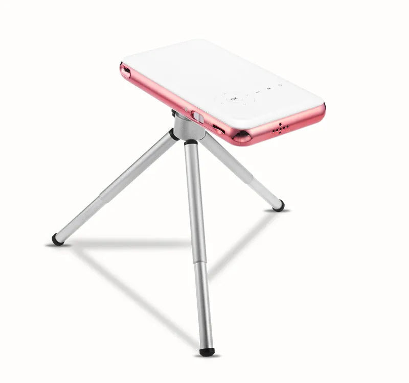 White and rose gold miniature portable DLP Android projector with 32GB memory showing compact dimensions