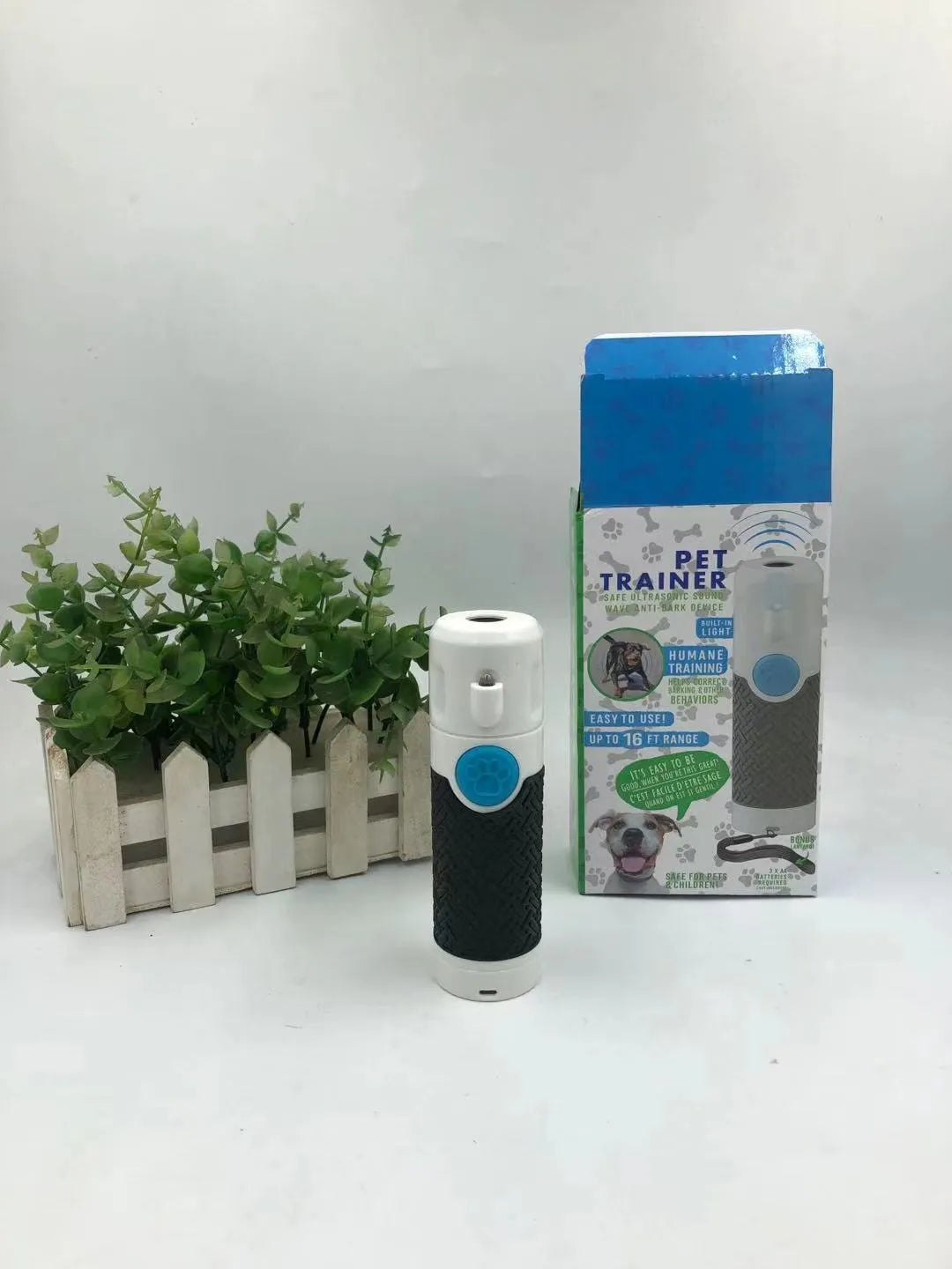 White ABS plastic ultrasonic dog trainer handheld device for bark control
