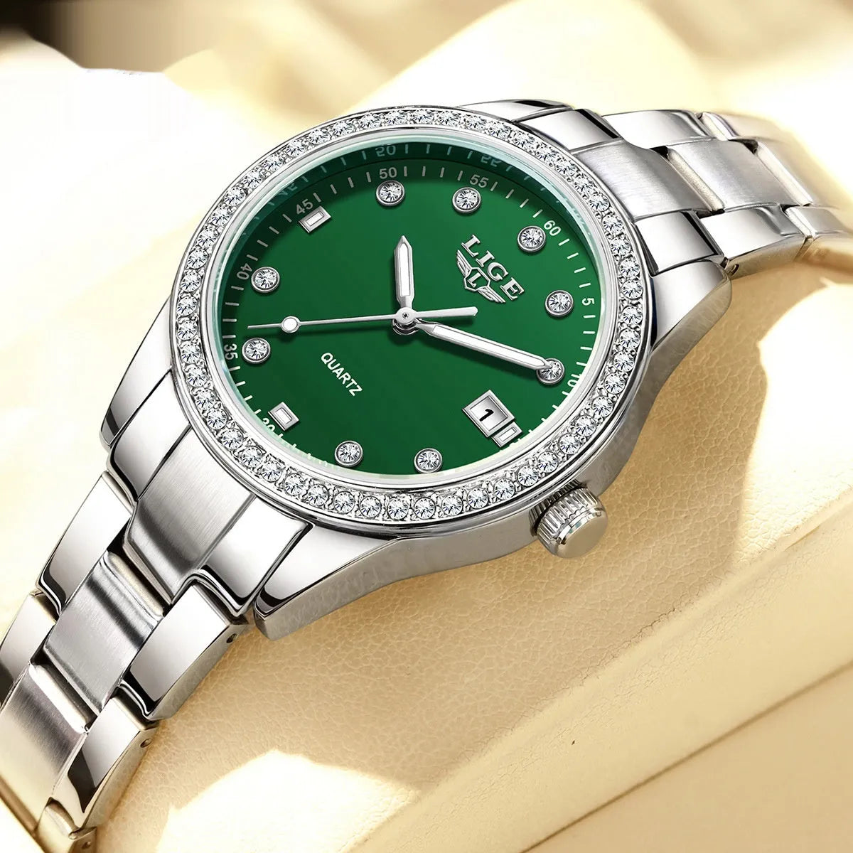 Silver stainless steel women's quartz watch with diamond markers and round dial