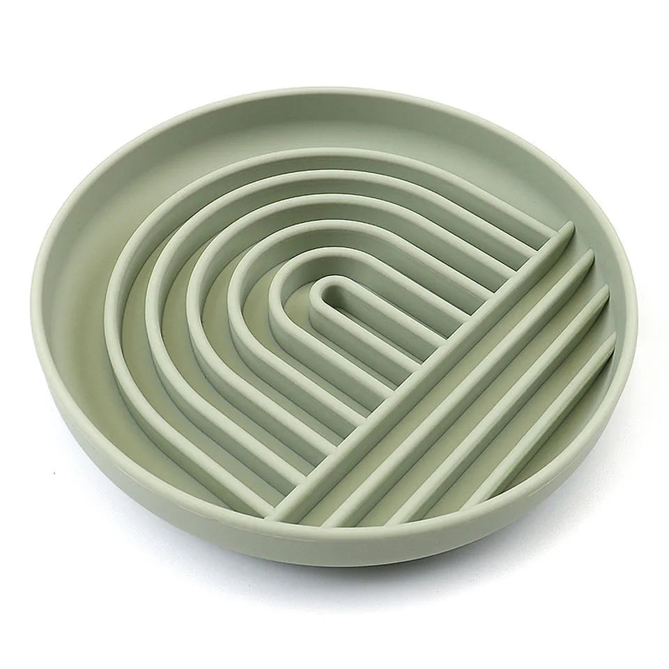 Silicone slow feeder dog bowl with textured ridges, shown in mustard green colour