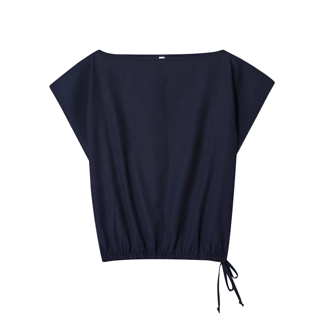 Women's linen blend off-neck shirt with flounced sleeves and matching wide leg trousers set.