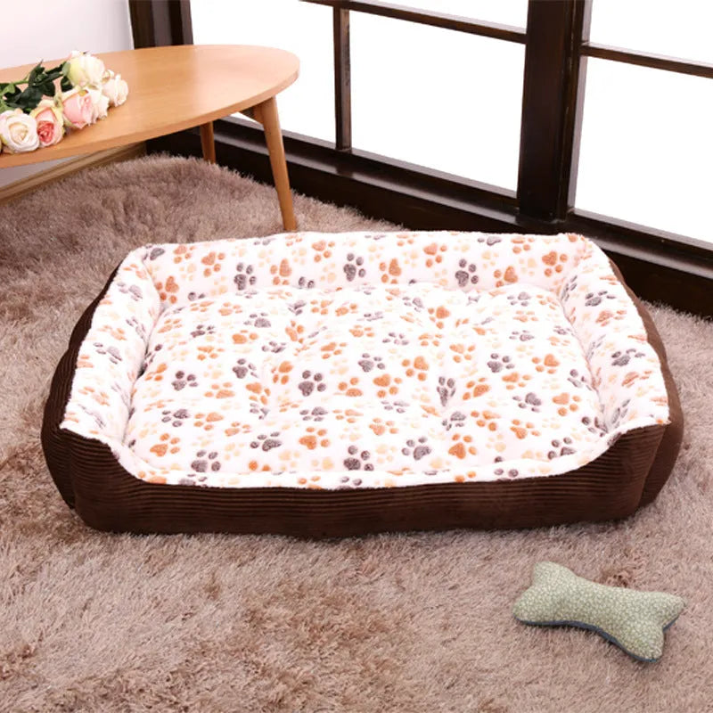 Orthopaedic foam dog bed with plush cover in beige, showing sofa-style raised edges and available in six sizes