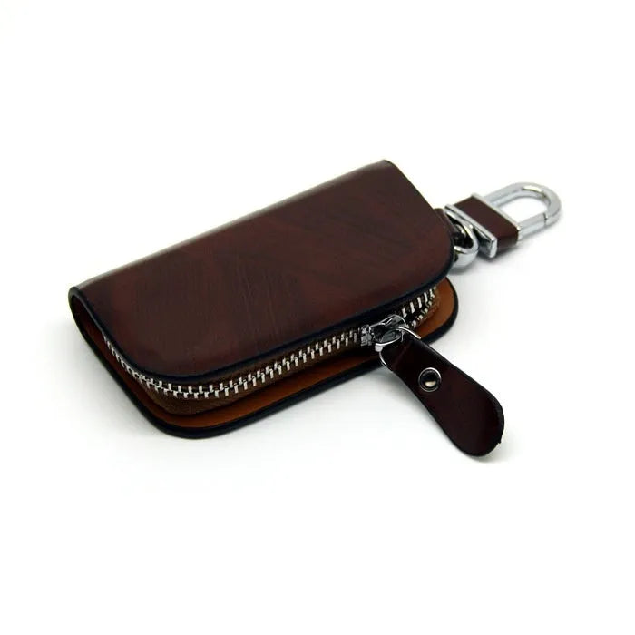 Genuine leather car key case with frosted finish in black or brown colour.