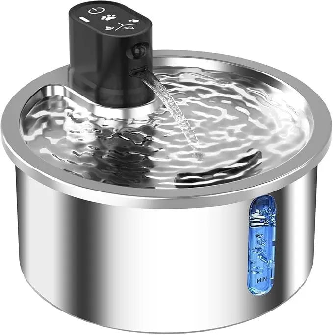 Stainless steel pet water fountain with heated base on countertop