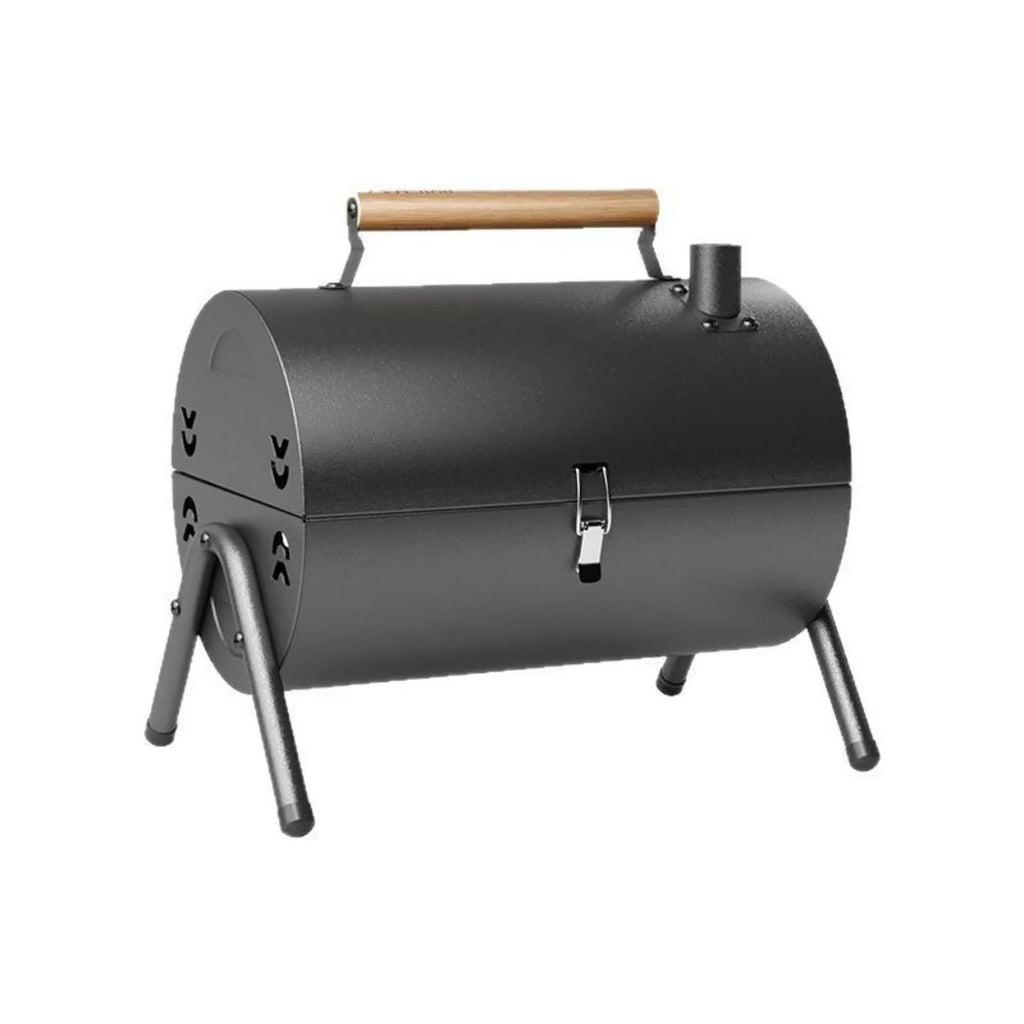 White round portable charcoal grill with chimney oven, grill mesh, and carbon tanks for outdoor cooking.