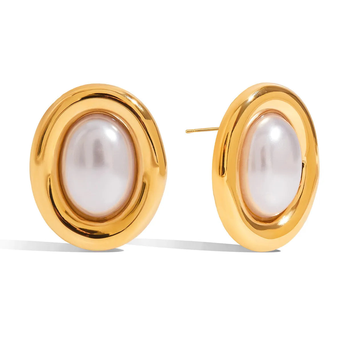 A pair of stainless steel stud earrings for women featuring a single vintage pearl, with butterfly clutch backings visible.