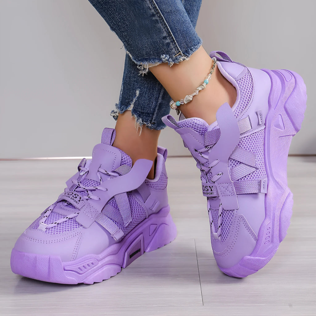 Women's purple platform mesh dad shoes with animal pattern detailing and lace-up front