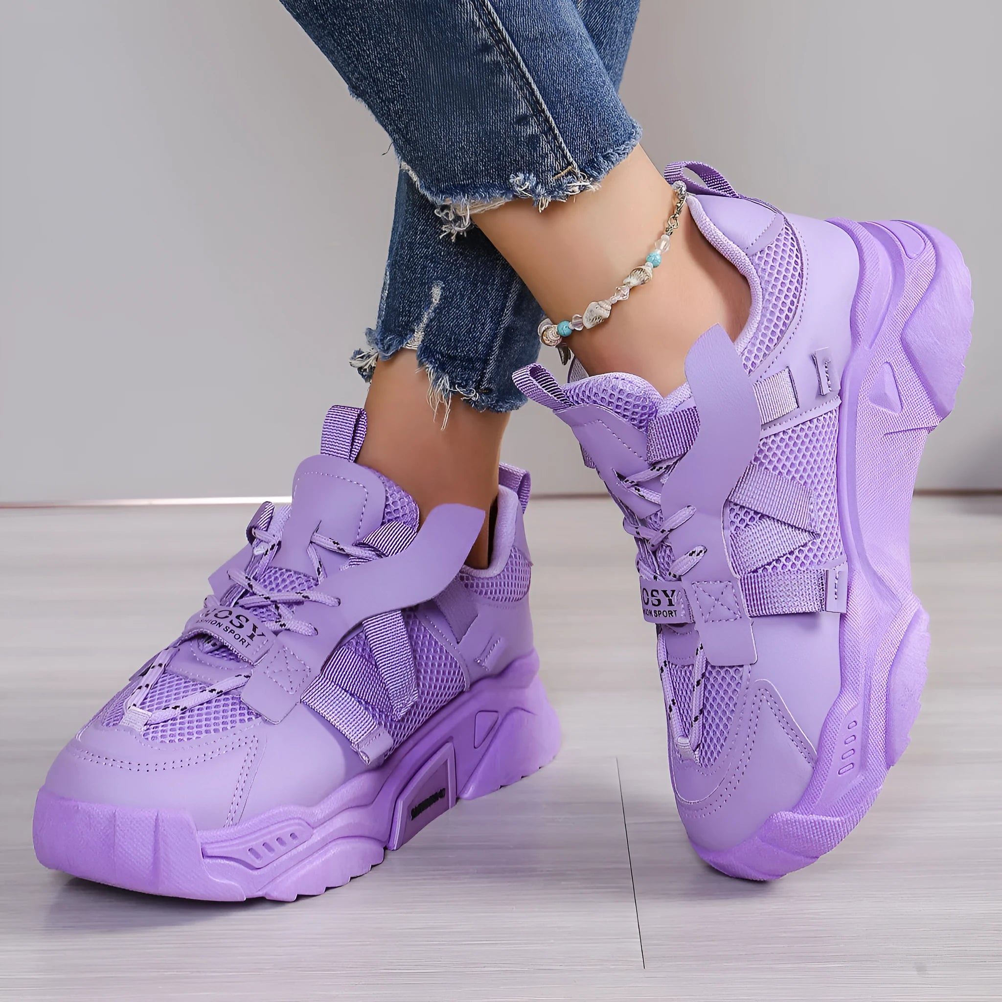 Women's purple platform mesh dad shoes with animal pattern detailing and lace-up front