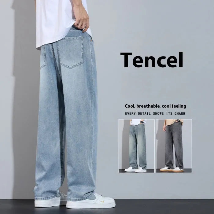 Light blue ice silk straight-leg wide trousers laid flat, showing zip fly and relaxed leg cut.