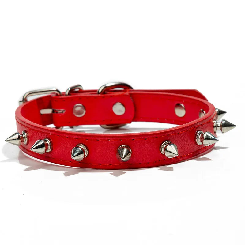 A studded dog collar made of black PU leather with metal studs and an alloy buckle
