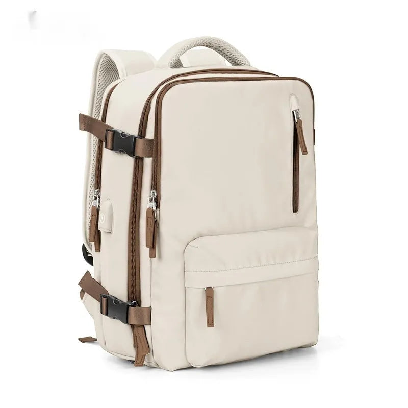 Large black waterproof nylon mummy backpack with zipped compartments.