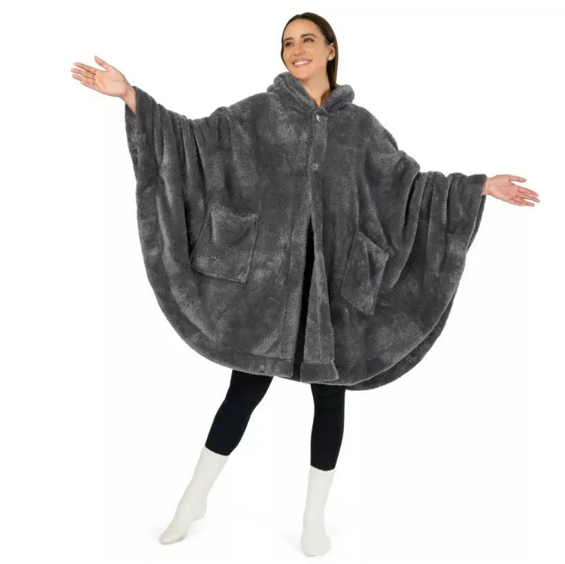 Thick hooded long sleeve bathrobe in black hanging on a hook