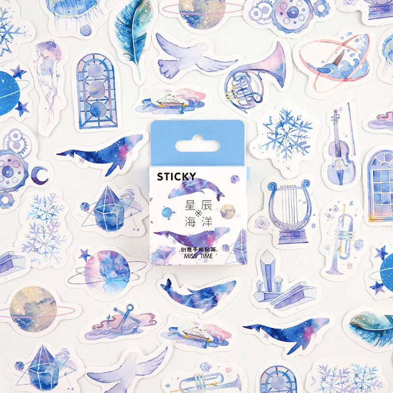 Open box showing 46 small cartoon pattern stickers for journal decoration, themes include Girlhood and Bubble Comic.