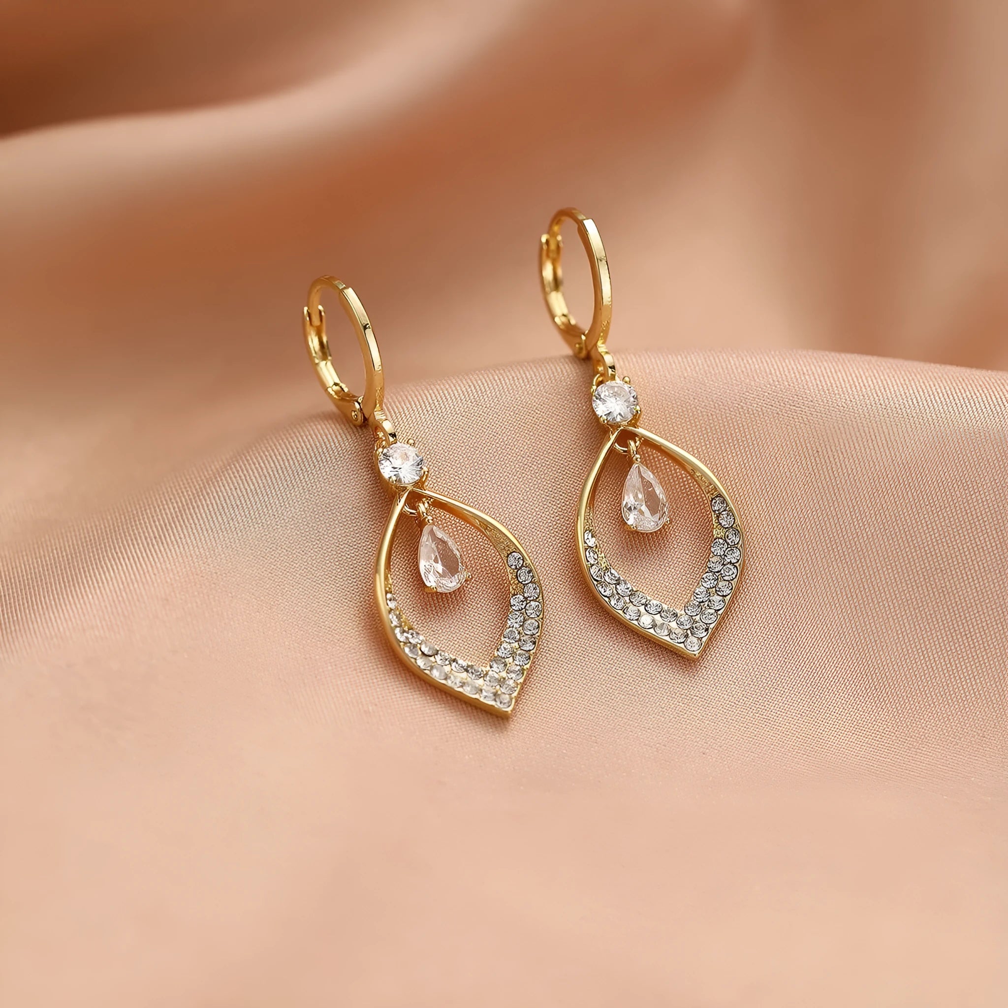 Zircon water drop tassel earrings in gold or silver with teardrop design and electroplated copper construction