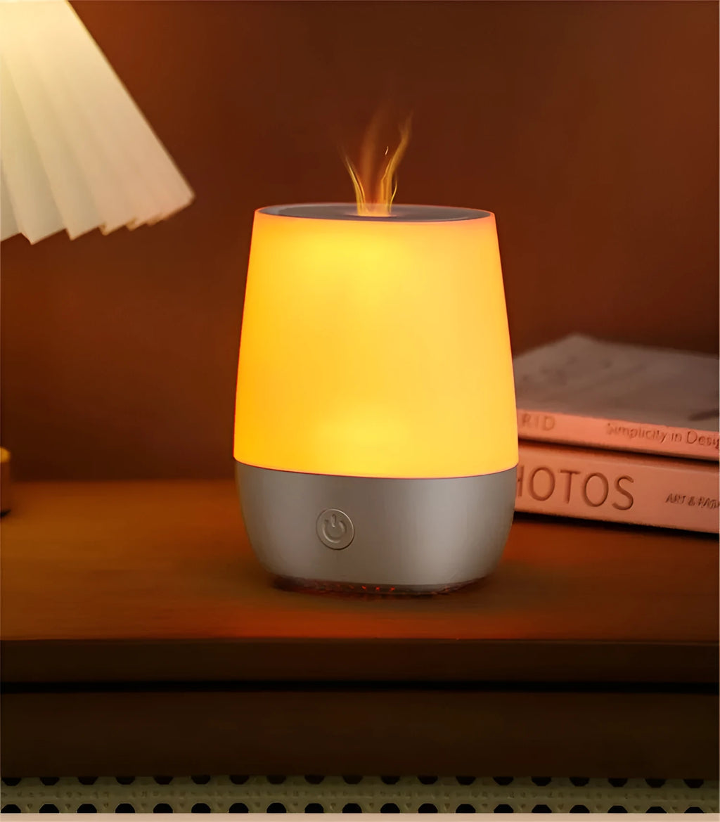 White USB aroma diffuser with simulated flame effect on wooden surface