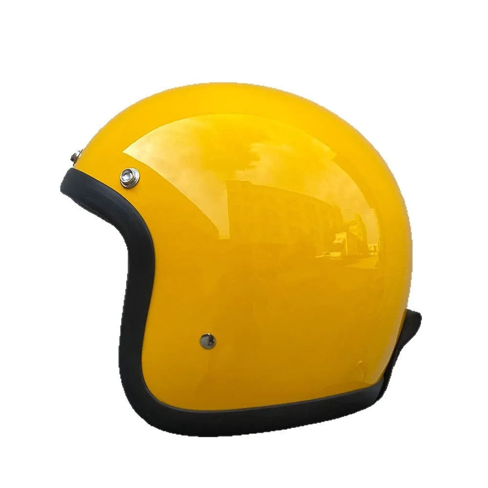 Glass fibre retro half motorcycle helmet shown in multiple colour options including cement grey and matte black flower patterns