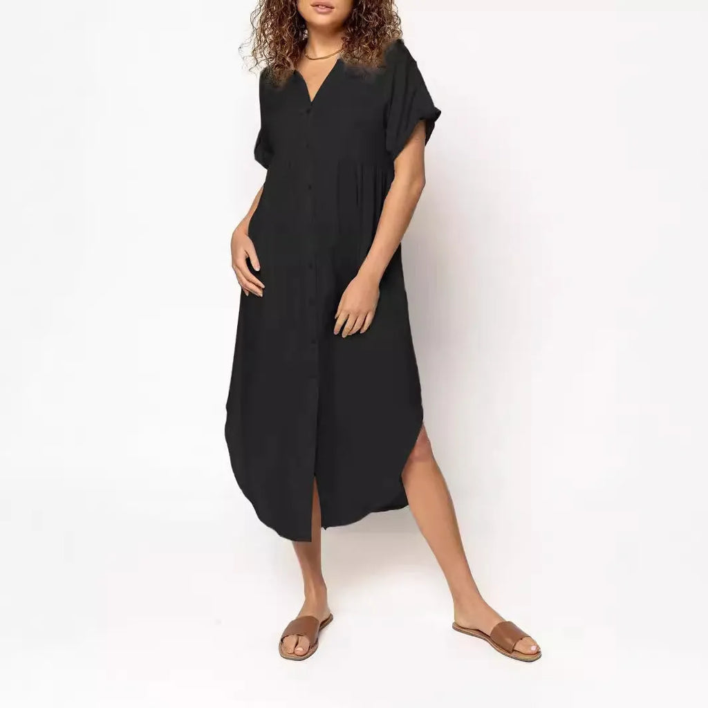 Women's loose-fit mid-length casual dress with button front in a solid colour.
