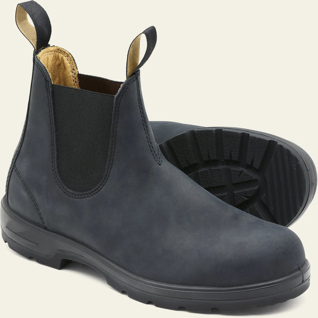 Unisex vintage brown Chelsea boots with a chunky sole and round toe on a white background