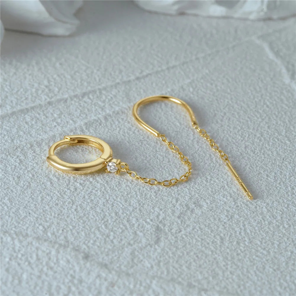 Geometric S925 sterling silver stud earring with flower, tassel, and chain design in a golden electroplated finish.
