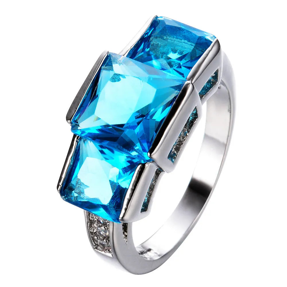 Women's wholesale electroplated copper ring in geometric design with rainbow elements on size chart