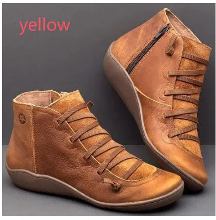 Women's flat casual booties with wedge heel and round toe in multiple colour options.