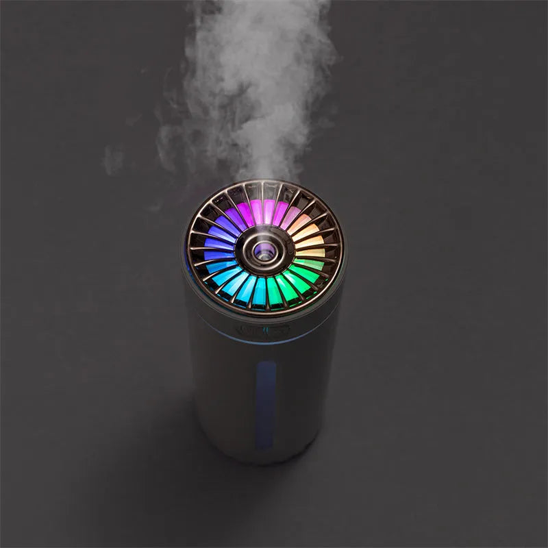 Black portable USB rechargeable humidifier with colourful LED lights and compact design for car or desktop use