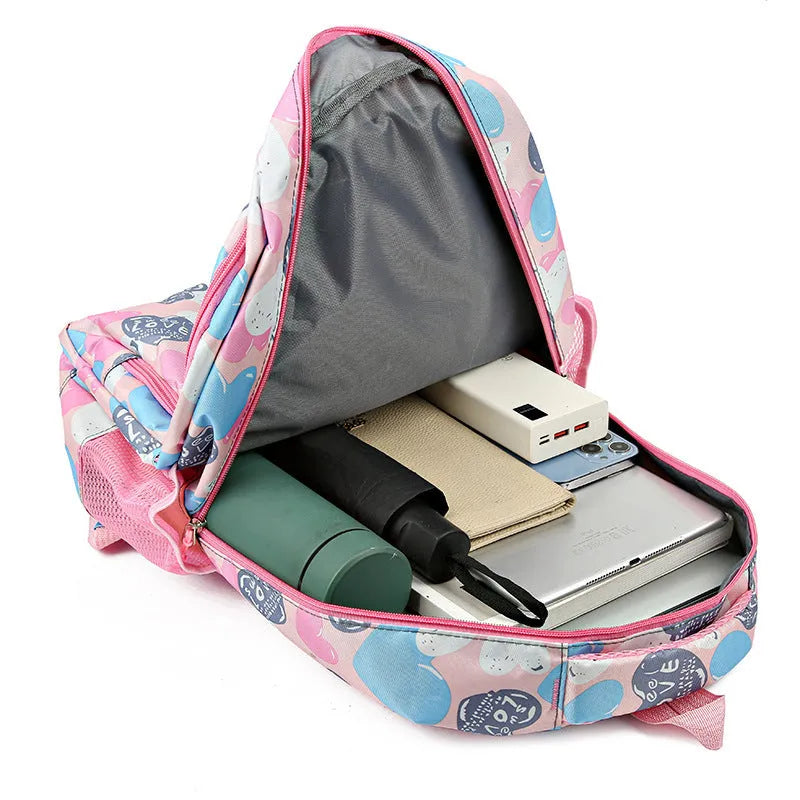 Blue children's school backpack with air pillow shoulder straps and Oxford cloth exterior
