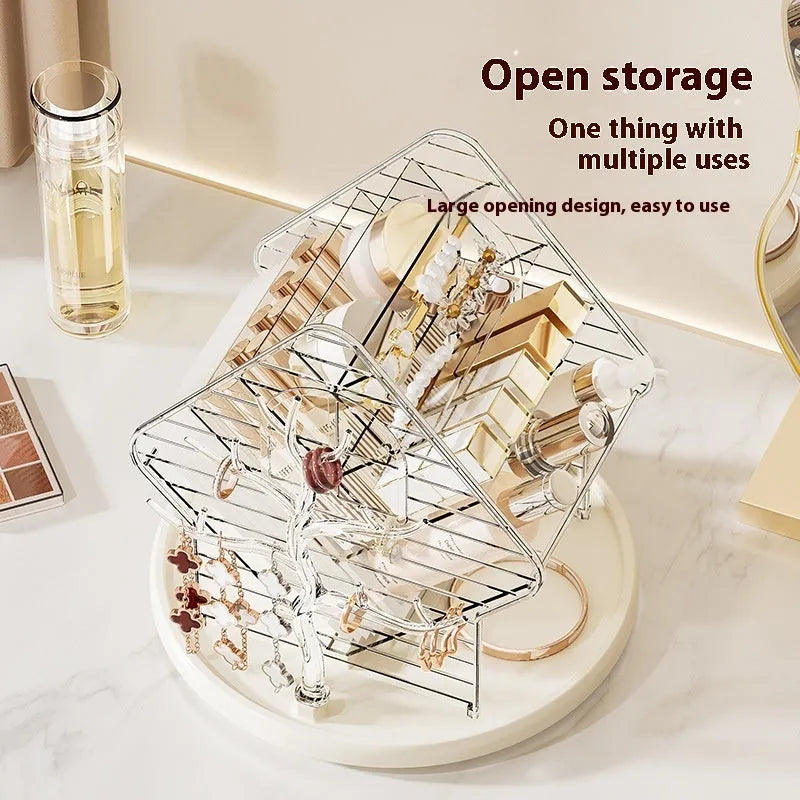 Clear and amber gold rotating cosmetics storage box organiser on a table.