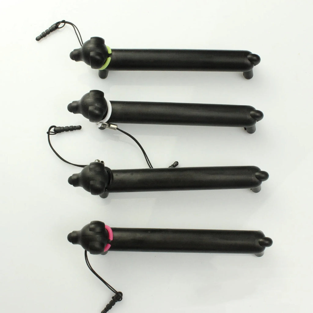 Black dog-shaped touch screen stylus with 12cm length shown on desk