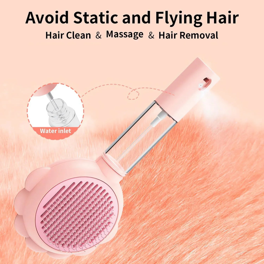 Grey spray function pet brush with stainless steel bristles and a self-cleaning button on the handle.