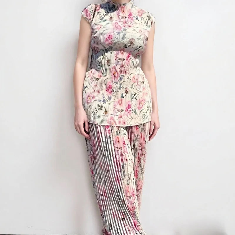 Two-piece printed chiffon dress set with long sleeves and high waist design showing separate skirt and top