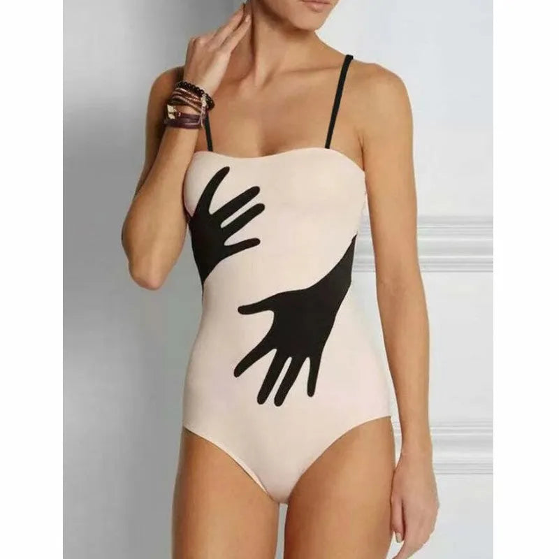 Women's one-piece bikini swimsuit with a gauze skirt cover-up.