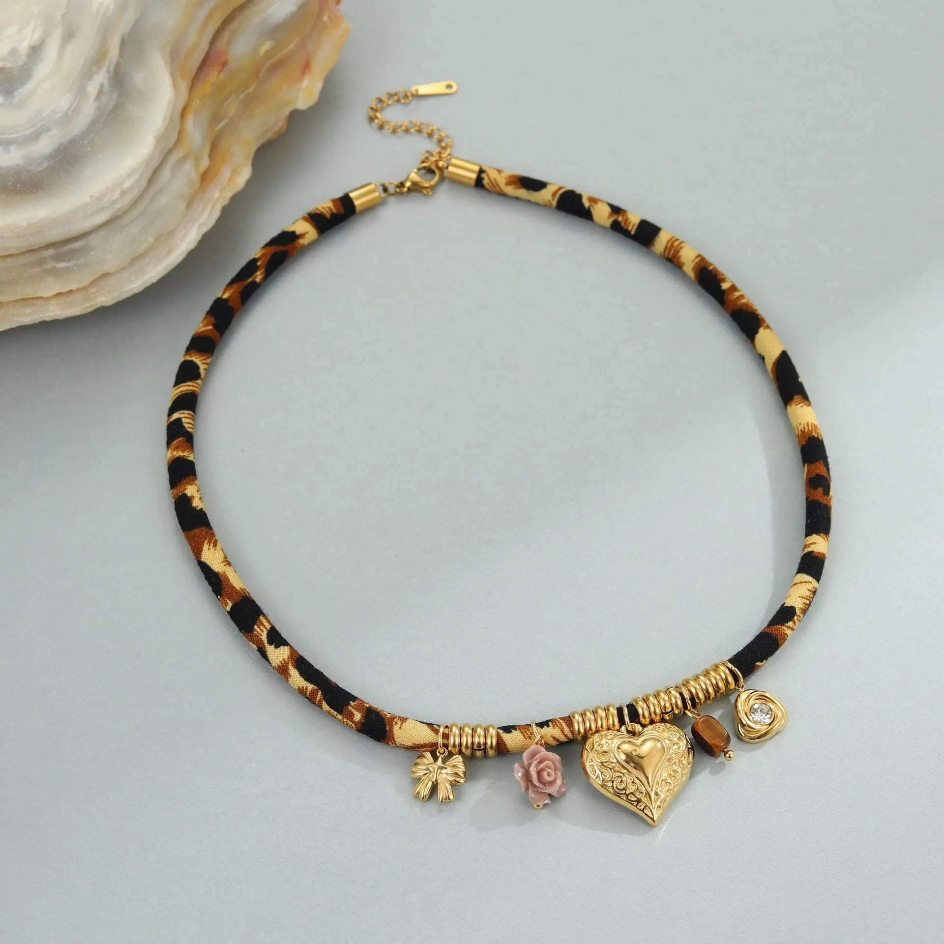 Stainless steel geometric necklace with gold electroplated finish and adjustable chain
