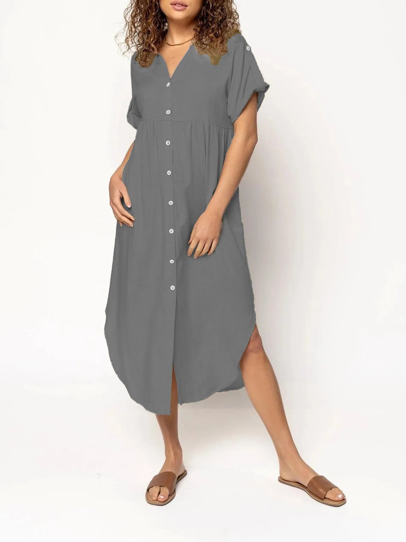Women's loose-fit mid-length casual dress with button front in a solid colour.