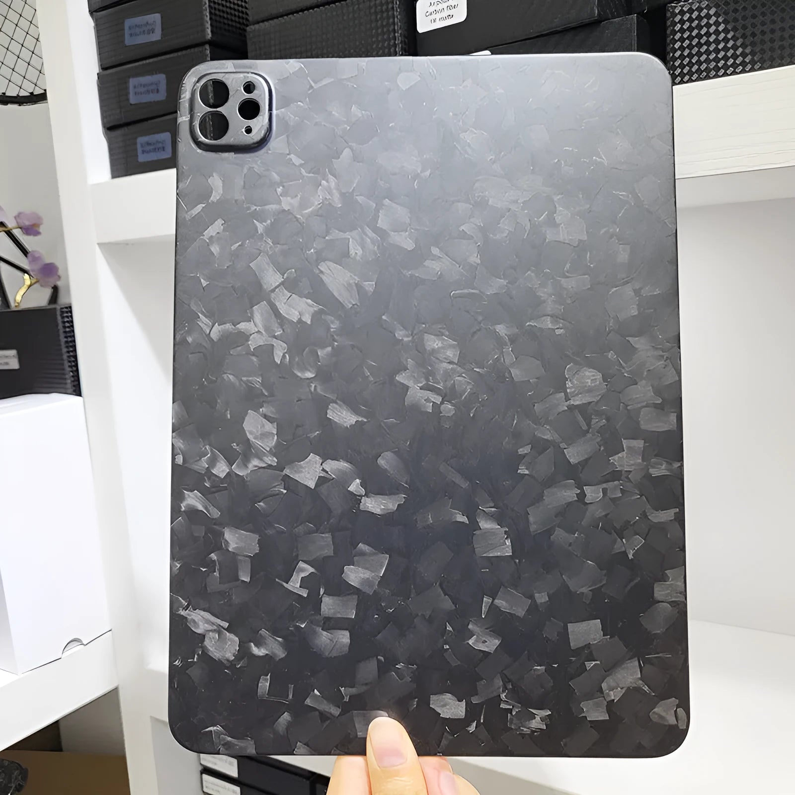 Genuine carbon fibre hard protective case for Apple iPad Pro 11 tablet in matte and forged finishes.