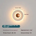 Round wall lamp in aluminium with adjustable gold and white light colour options