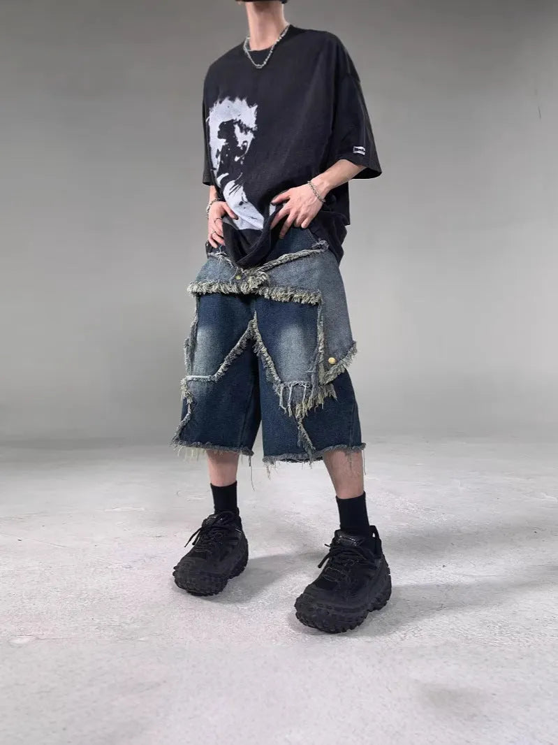 Blue denim shorts with American retro style, frayed detailing, and five-pointed star patches